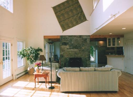 Soaring Ceilings and Massive Fireplace. Click to Enlarge.