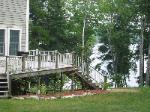 Side yard with lake beyond
